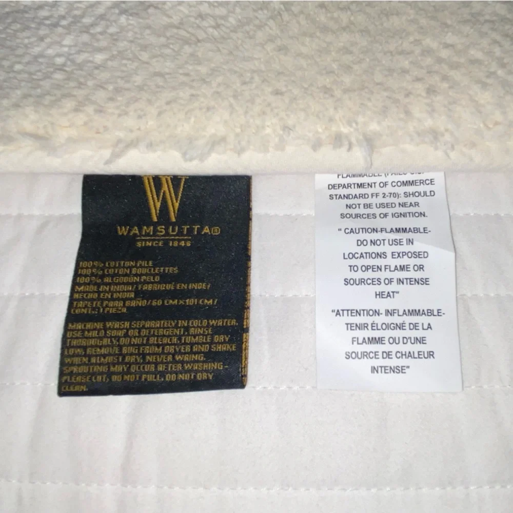 43” x 24” cream/ivory Bathroom Rug